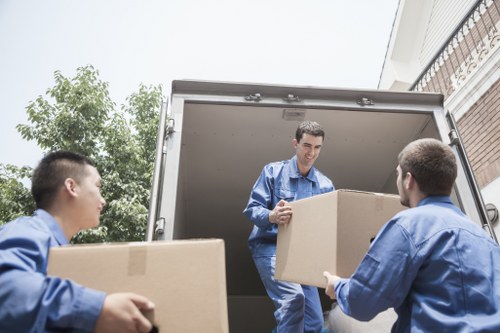 Removal team planning a flat move in a Beddington apartment block