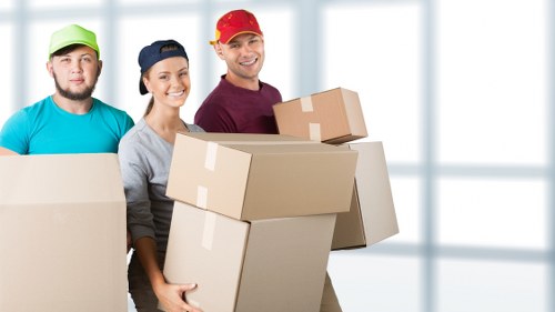 Office furniture and packed files ready for a planned move in Beddington