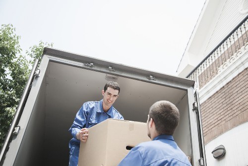 Local moving van handling furniture and boxes in Beddington