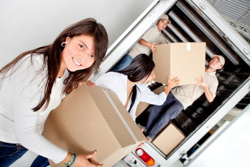 A coordinated office move with labelled equipment and workstations